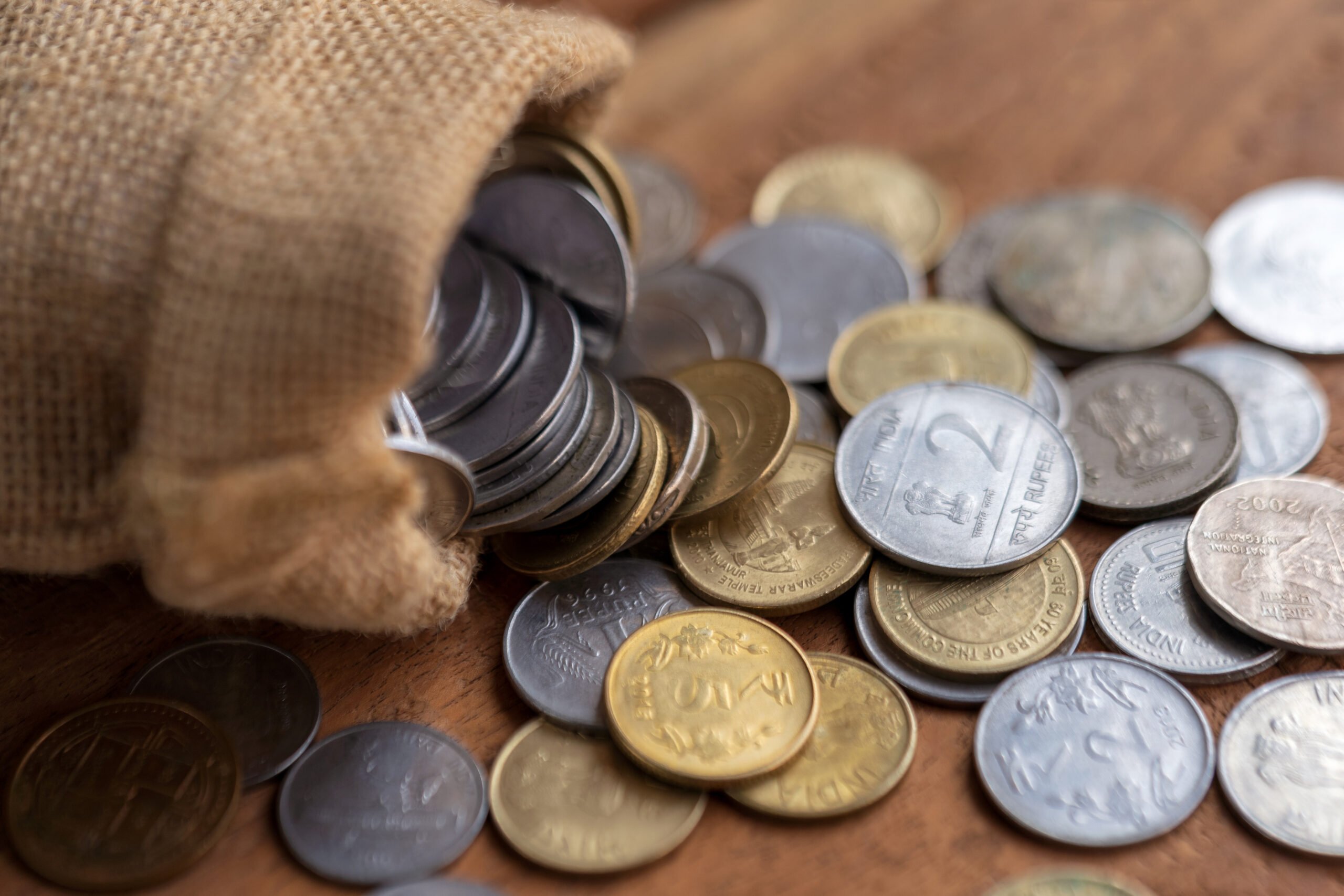 Coins falling from a sack