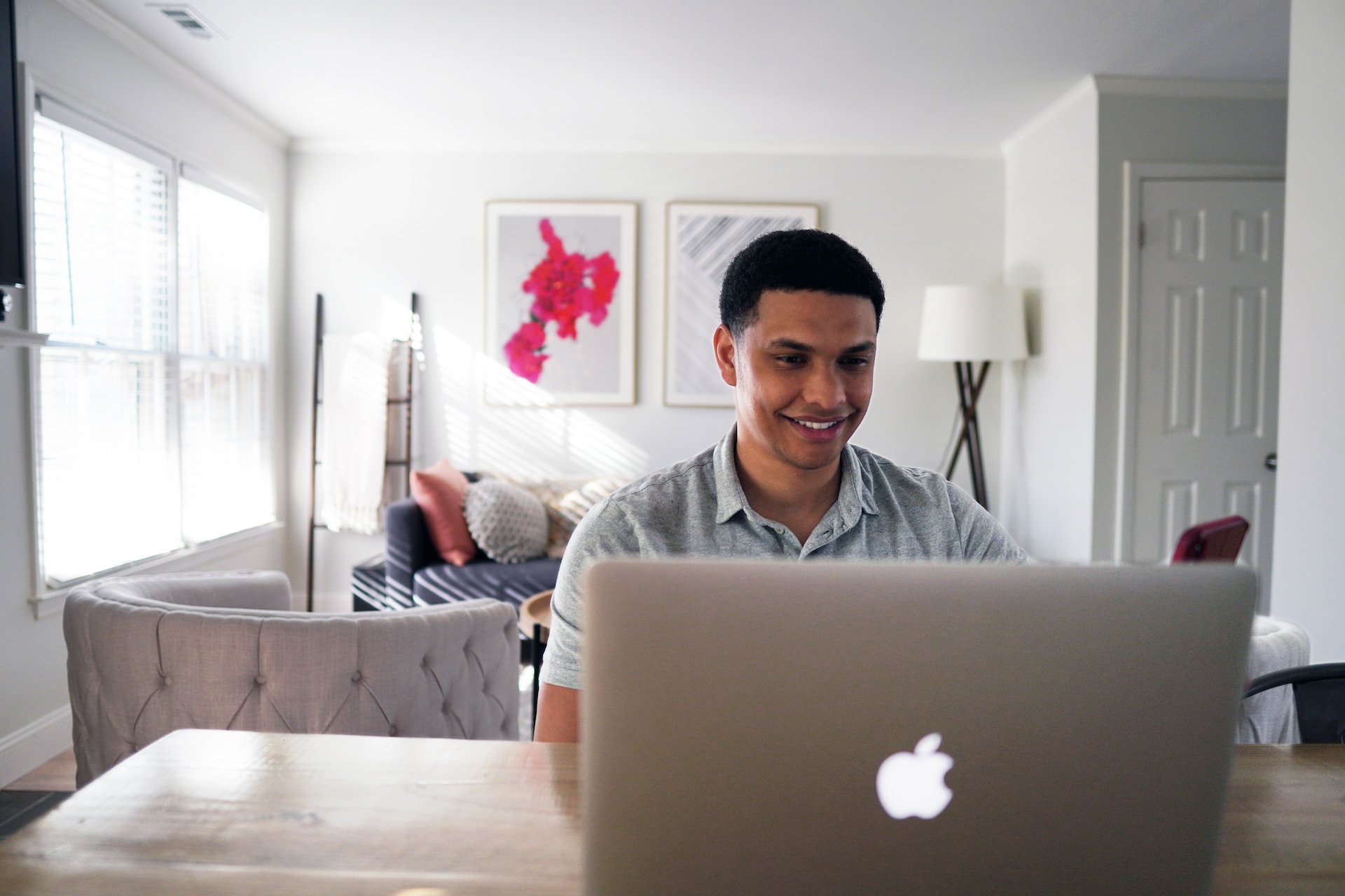 A boy looking at his laptop screen